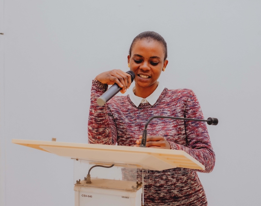 Keynote Address – Miss Adejumo Oyinade delivering the keynote address on behalf of Dr Peter Akosile at the Official Opening of Mojisola Grace Humanitarian Foundation.