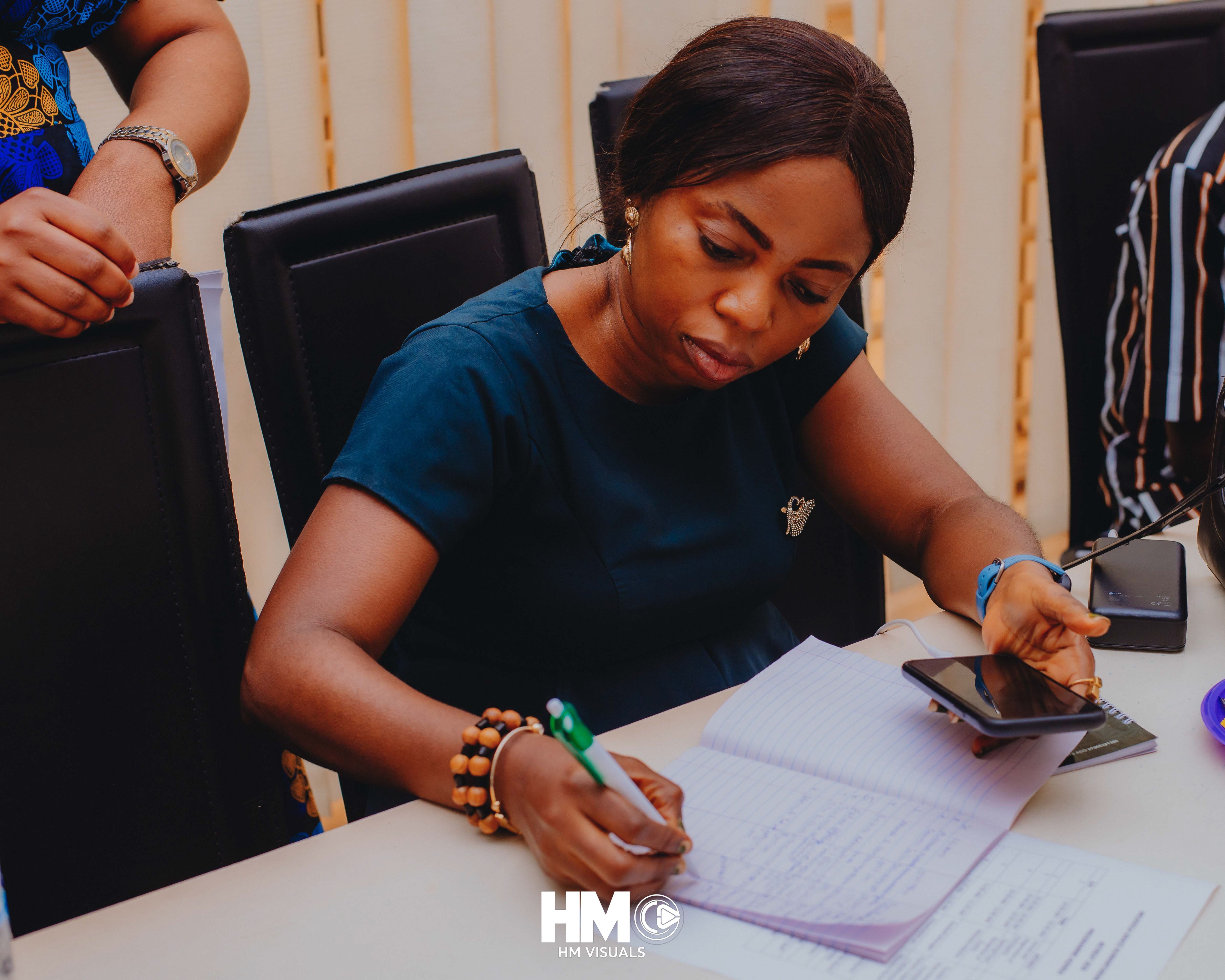 Mrs. Adekanbi Yetunde during the registration session at the Official Opening of Mojisola Grace Humanitarian Foundation.