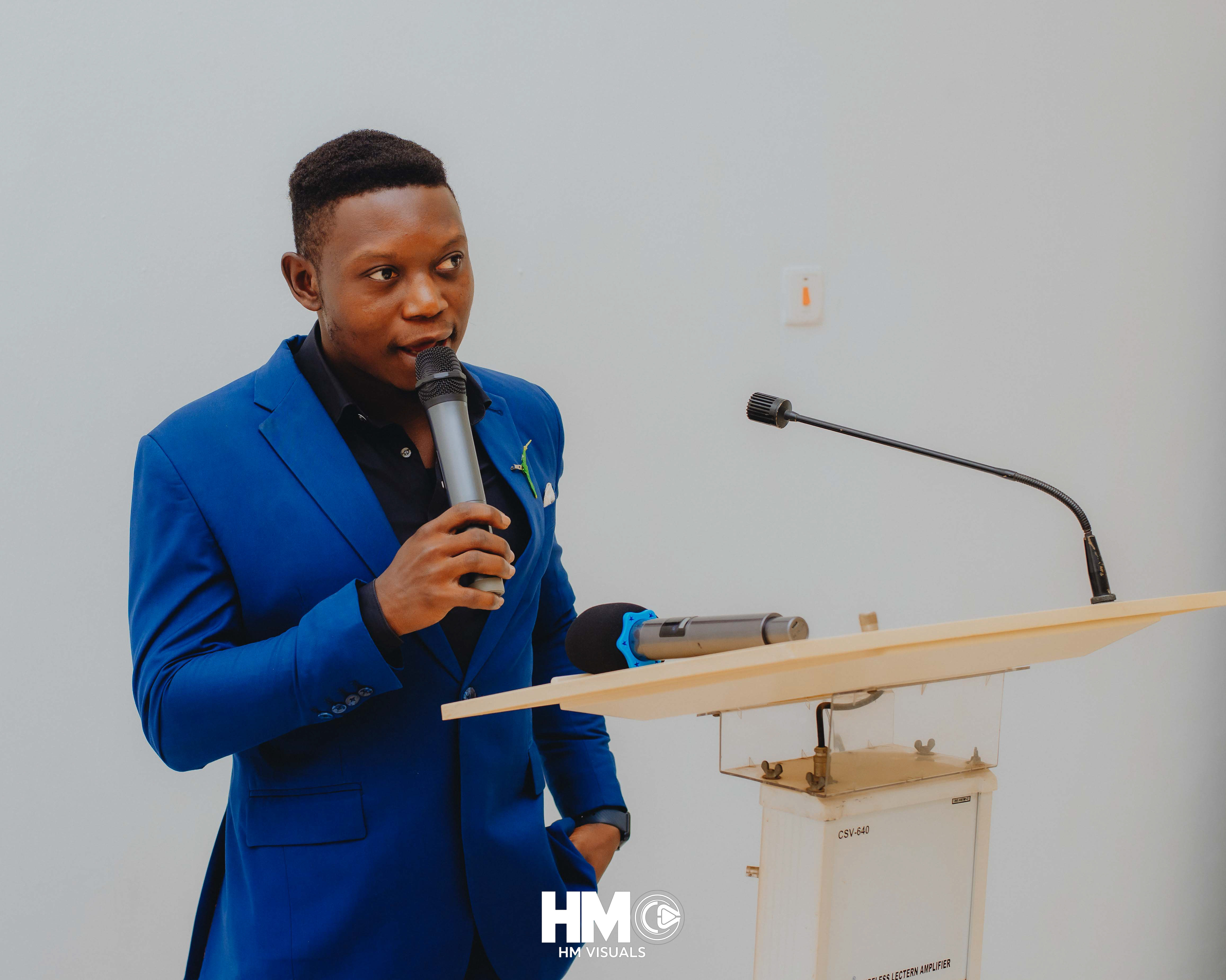 The Master of Ceremonies (MC) coordinating proceedings during the Official Opening of Mojisola Grace Humanitarian Foundation.