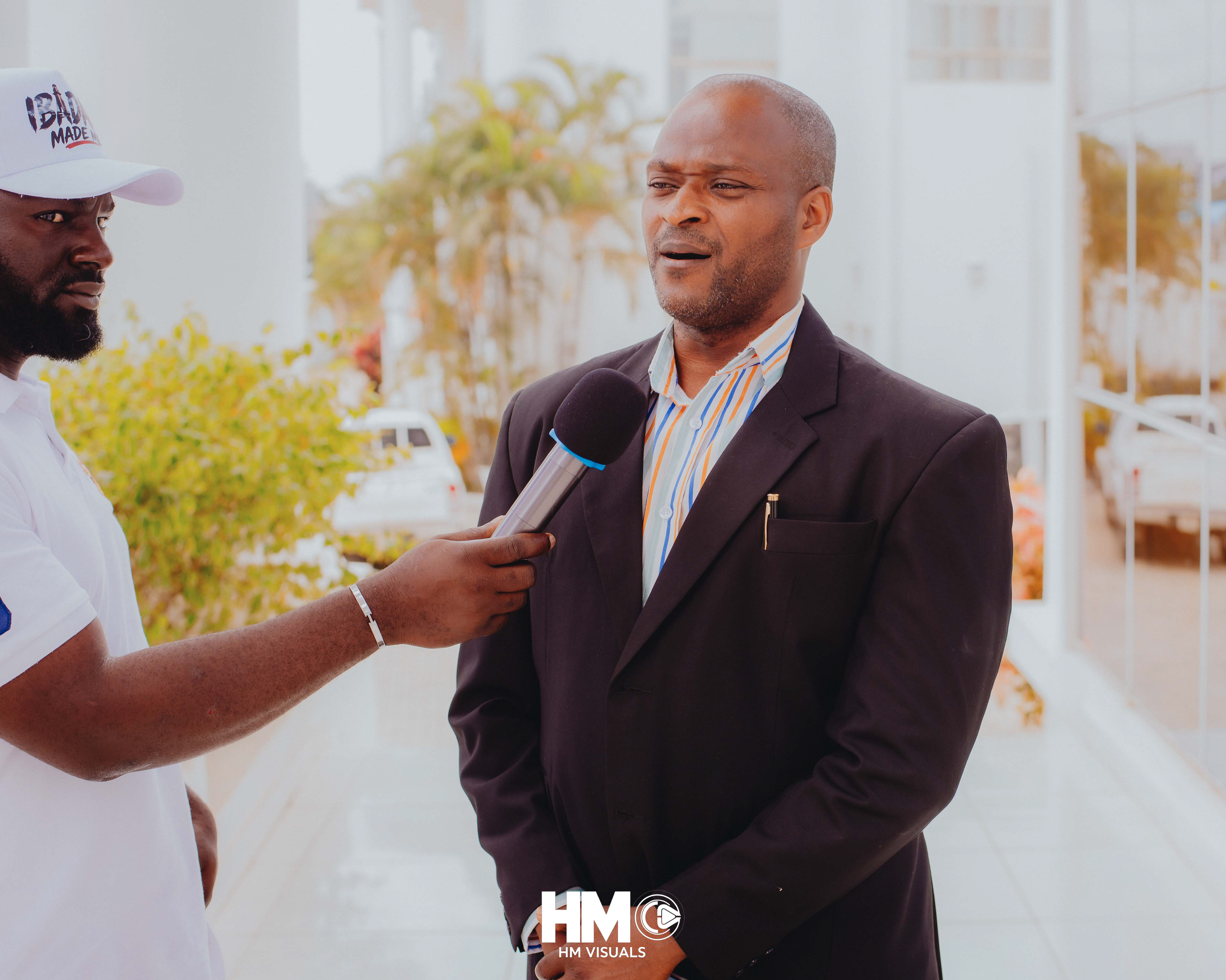 Resource Person, Mr. Alex Akinsola, during a media interview at the Official Opening of Mojisola Grace Humanitarian Foundation.